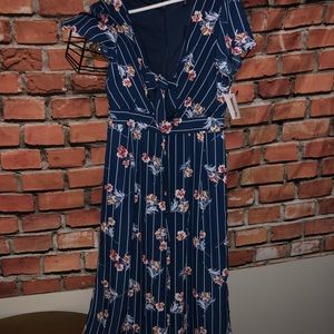 Calf length floral jumpsuit. Never worn